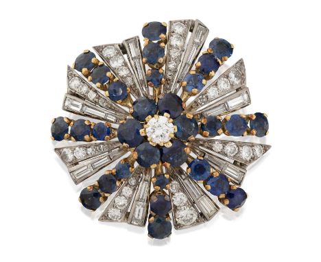the central flowerhead cluster formed of a round brilliant cut diamond within a border of round cut sapphires, to eight radia