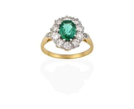 the oval cut emerald within a border of round brilliant cut diamonds, in white claw settings, to a round brilliant cut diamon