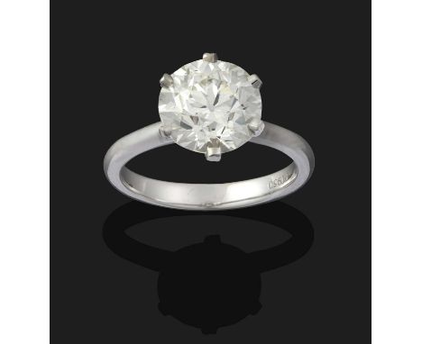 the old cut diamond in a claw setting, to a tapered shoulder plain polished shank, estimated diamond weight 2.85 carat approx