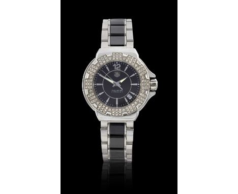 quartz battery driven movement, black dial with Arabic and dagger markers, date aperture, diamond set bezel, protected screw 