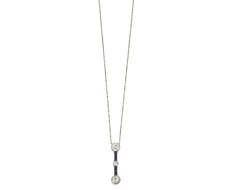 three old cut diamonds alternate with calibré cut sapphires, in white millegrain settings, suspended from a trace link chain,