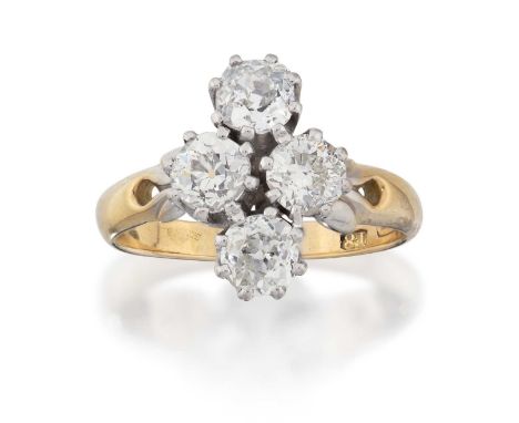 the old cut diamonds designed as a cluster, in white claw settings, to a yellow plain polished shank, total estimated diamond