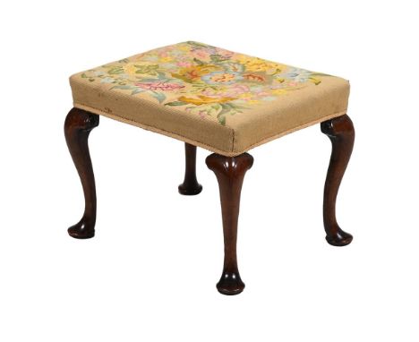 A WALNUT AND NEEDLEWORK UPHOLSTERED STOOL IN GEORGE II STYLE  LATE 19TH CENTURY 42cm high, 57.5cm wide, 47cm deep  Condition 