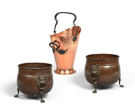 A PAIR OF COPPER LOG BINS  IN REGENCY STYLE, 19TH CENTURY  With lion mask handles  34.5cm high, 42cm wide   TOGETHER WITH An 