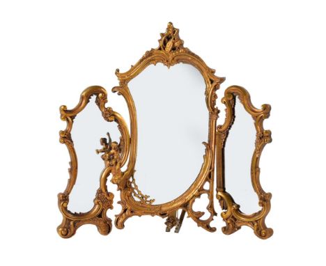A GILTWOOD TRI-FOLD DRESSING TABLE MIRROR  IN BAROQUE STYLE, OF RECENT MANUFACTURE  64cm high, 64cm wide, 20cm deep Provenanc
