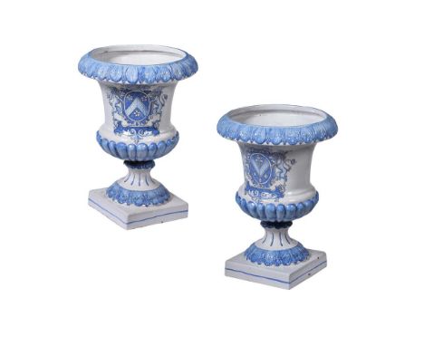 A PAIR OF LARGE ITALIAN MAIOLICA ARMORIAL PEDESTAL URNS  MODERN 63cm high, 30cm square Provenance: Private Collection, Lancas