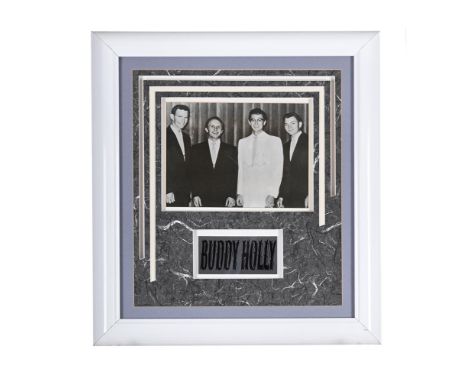 BUDDY HOLLY, A FRAMED DISPLAY INCORPORATING A SIGNED PHOTOGRAPH OF BUDDY HOLLY AND THE CRICKETS Autographed in ink by Buddy H