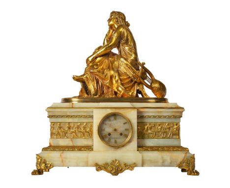 AN ONYX AND GILT BRASS MOUNTED CLOCK SIGNED SCHOENEVER K., LATE 19TH CENTURY  with a a seated classical muse 56cm high, 52cm 