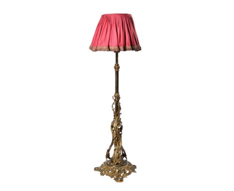 AN ORNATE METAL STANDING FLOOR LAMP 20TH CENTURY With shade 148cm high, 165cm high with shade, base 47cm Provenance: Private 