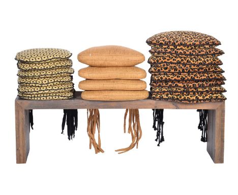 A GROUP OF EIGHTEEN SEAT CUSHIONS WITH TIES OF RECENT MANUFACTURE  six repeated geometric patterned 40cm wide, 36cm deep, fou