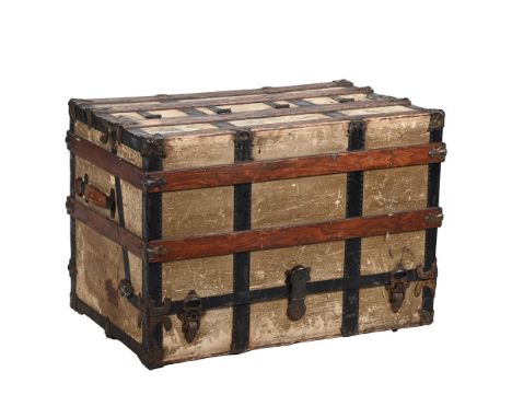 A CANVAS AND METAL-MOUNTED STEAMER CABIN TRUNK EARLY 20TH CENTURY With a fitted interior 61cm high, 90cm wide, 55.5cm deep Co