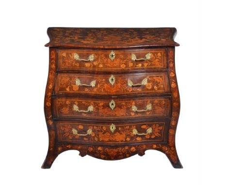 A DUTCH WALNUT VENEERED AND FLORAL MARQUETRY COMMODE LATE 18TH CENTURY Of bombe outline, with arrangement of four drawers, on