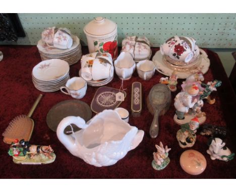 A quantity of various and miscellaneous china, to include: cups, saucers, side plates, various figurines and associated items