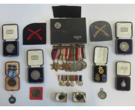 A group of various medals, to include: Four Star Defense medal, various WWI & WWII medals, various shooting sport and associa