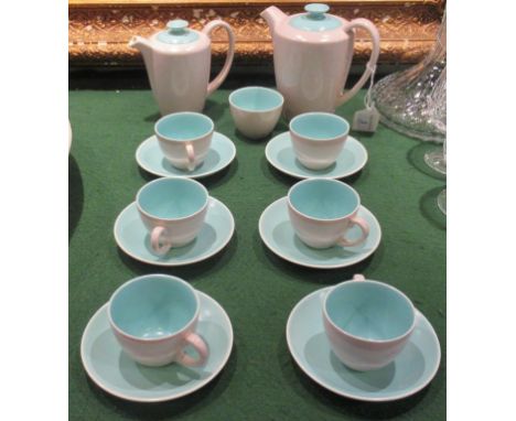 A Poole two tone coffee service, comprising: coffee pot, water jug, sugar bowl and six cups &amp; saucers.