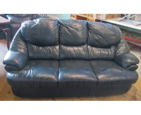 A contemporary blue leather three seater sofa.