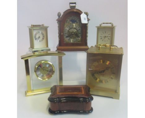 An Acctim bell strike mantle clock, together with two further contemporary mantle clocks, two carriage clocks and a music box