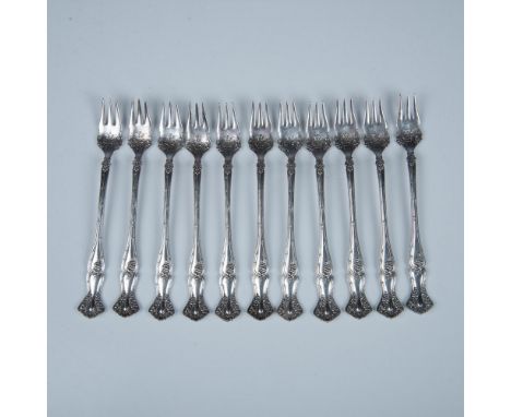 11 beautiful 3 tine forks with the design continued into the base of the fork. Marked Rogers Bros. XS triple to the back. Dim