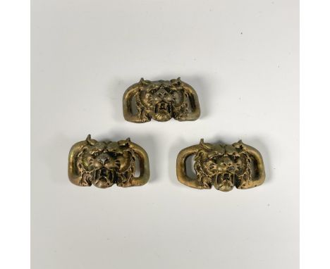 A set of 3 heavy sash or curtain accessory. Fine details in the lion's face. Dimensions: 2.25"W x 1.25"HCondition: Age relate