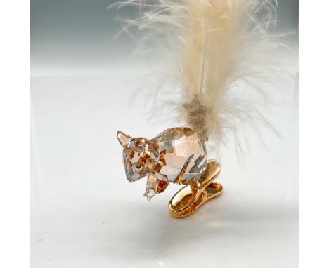 Part of the Merry Christmas theme. Figural is designed in amber crystal holding a star with his crystal bushy feather tail at