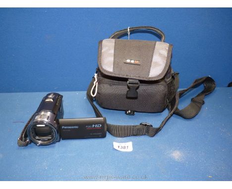 A Panasonic HC-V700 Full HD Digital Video Camera with Battery, Charger and Case, etc.,