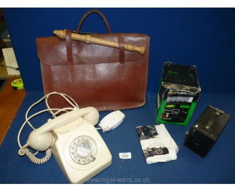 A quantity of miscellanea to include a Box camera (1910-1935), Polaroid camera, 1950's white telephone, music case and sheets
