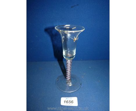 A rare staple repaired 18th c. coloured air twist stem Wine Glass, a thread of red running outside a central white twist; (ch