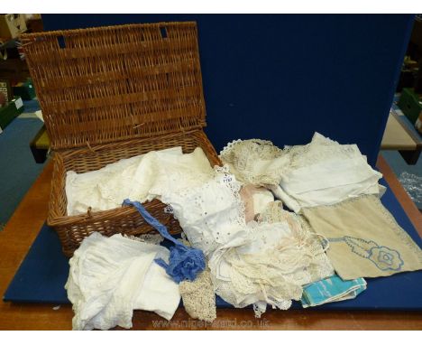 A hamper a/f. together with lace cloths, dressing table mats etc.