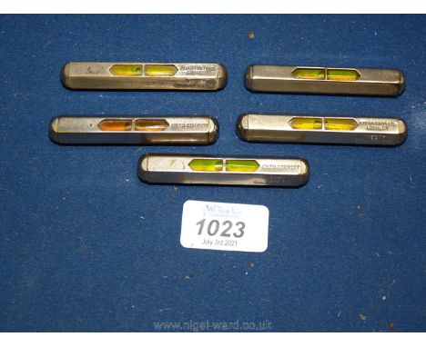 Five vintage miniature spirit levels by Vest, approx. 3" long.