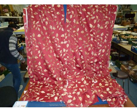 Two pairs of lined Curtains in rust and gold leaves pattern, 48'' wide x 44'' drop and 104'' wide x 63'' drop.