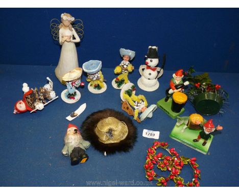 A quantity of vintage Christmas ornaments and decorations, some made from pine cones including wreaths, angels, snowman, elve