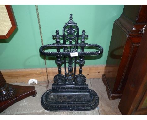 A cast iron stick stand.