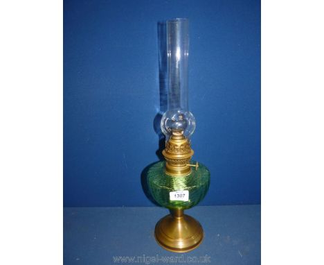 An Oil Lamp with green glass reservoir, no shade, 19 1/2'' tall including chimney.