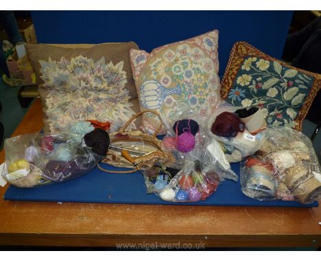 A box of embroidery threads, knitting wool, knitting bag, tapestry cushion, etc.