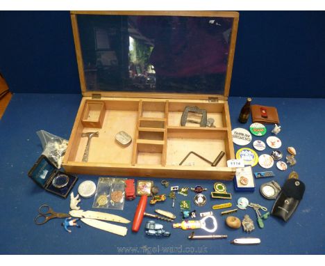 A box of miscellaneous curios including miniature Marshall Horse box by Lesney (box missing),  badges, enamel badges etc., mi