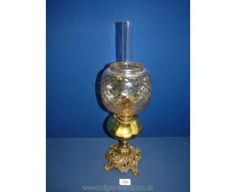 An ornate based Oil Lamp with green glass reservoir and diamond patterned glass shade, 19 1/2'' tall including  chimney.