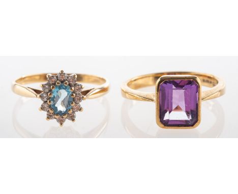 Two 9ct gold dress rings, including a single stone ring set with a rectangular-cut amethyst, UK import mark, size M1/2, 3.1gr