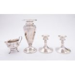 A mixed group of silver; including a pair of dressing table candlesticks by Jones & Crompton,