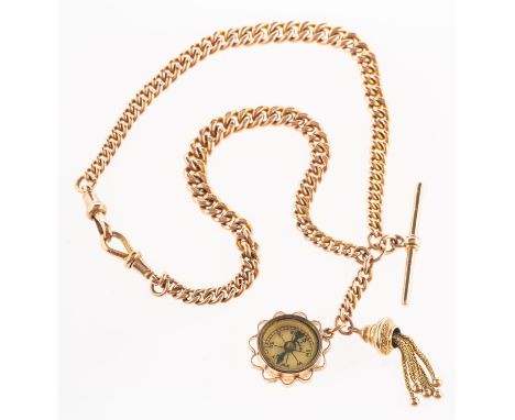 A 9ct gold Albert chain, with t-bar and two fixed swivel clasps, an attached 9ct yellow gold compass charm with a St Christop