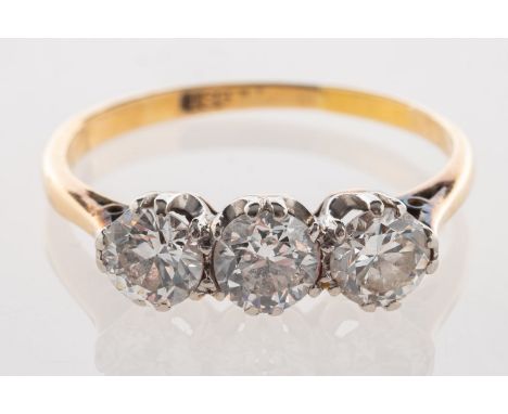 A three stone diamond ring, set with three old European-cut diamonds, diamonds approx. 0.90 carat total, indistinctly marked 