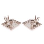 A pair of electro plated nickel silver chamber sticks by Richard Hodd & Son London,