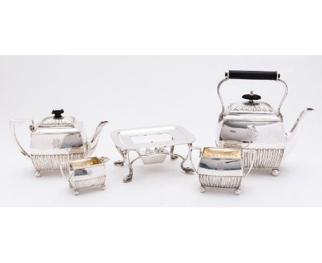A Victorian silver four piece tea service by Horace Woodward & Co (Edgar Finley & Hugh Taylor), London 1889, with registratio