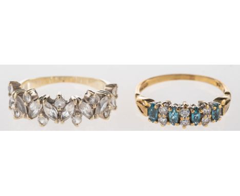 A group of two rings, including a 9ct gold half eternity style ring set with four oval-cut blue topaz, interspaced with circu