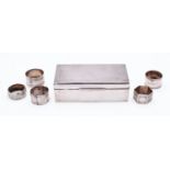 A George V silver cigarette casket by Walker & Hall, Sheffield 1939, of rectangular form,
