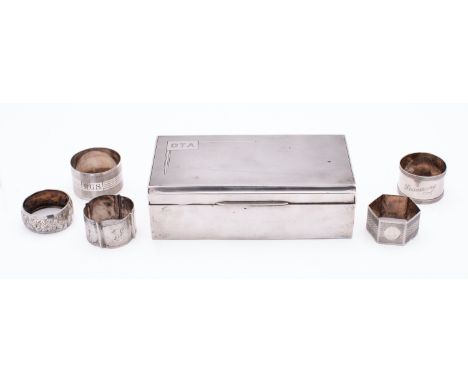 A George V silver cigarette casket by Walker & Hall, Sheffield 1939, of rectangular form, lined and loaded, the lid with engi