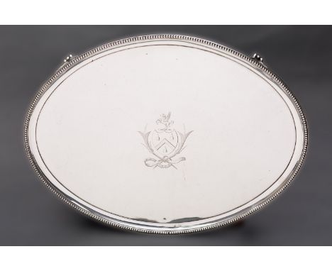 Royal Naval Interest; a George III silver presentation tray by Elizabeth Jones, London 1787, of oval form with beaded rim, ra