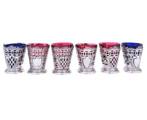 A set of six Victorian silver posy vases with glass inserts by Charles Boyton, London 1892, of flared form, with openwork dec