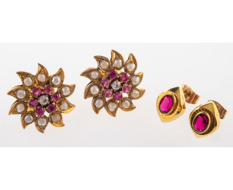 A group of two pairs of earrings originating from India,  including a pair of large flowerhead earrings, each set with a circ