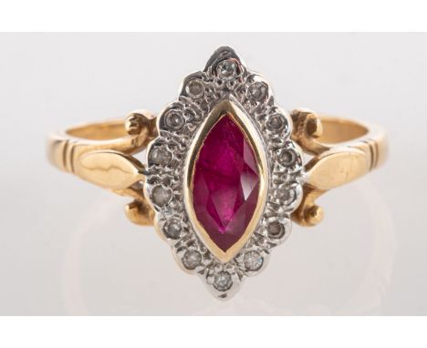 A 9ct gold ruby & diamond ring, a navette shaped ring set to the centre with a marquise-cut ruby, surrounded by small single-