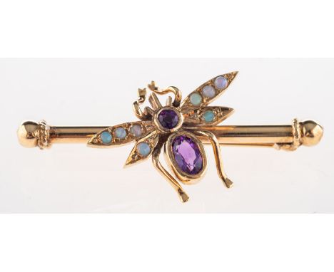 A 9ct gold insect brooch, in the form of a butterfly, set with a circular-cut & an oval-cut amethyst and opal cabochons, leng